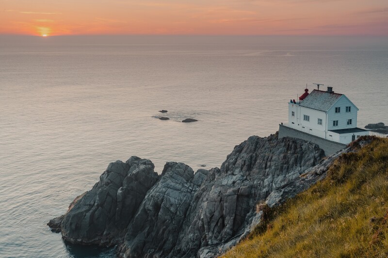 Lighthouse on the cliff edge in Norway
