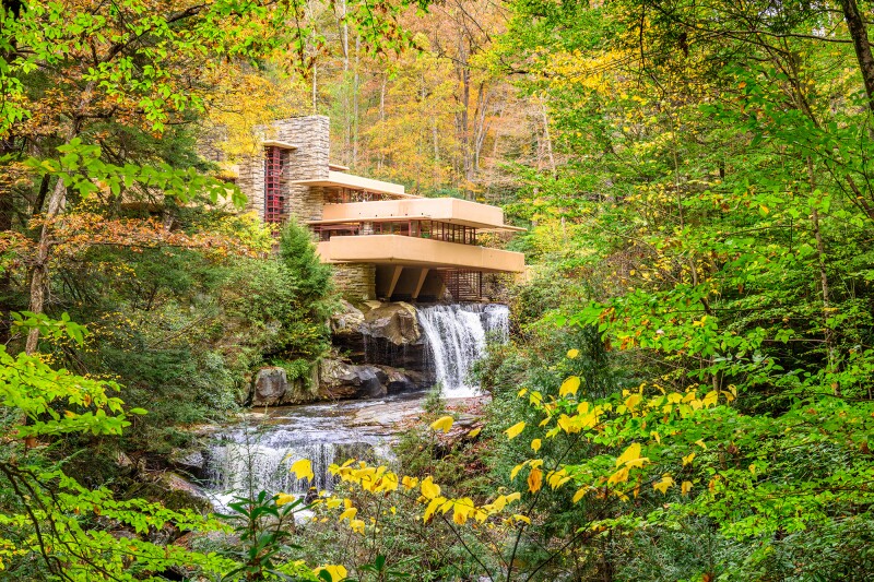 A sideview of Fallingwater, with the river below