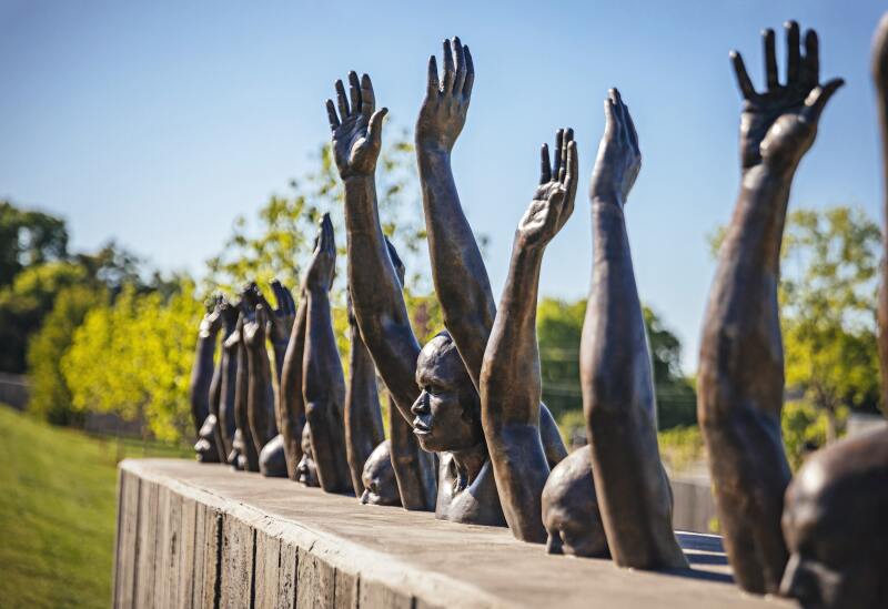 A sculpture by Hank Willis Thomas addresses contemporary problems of police violence.