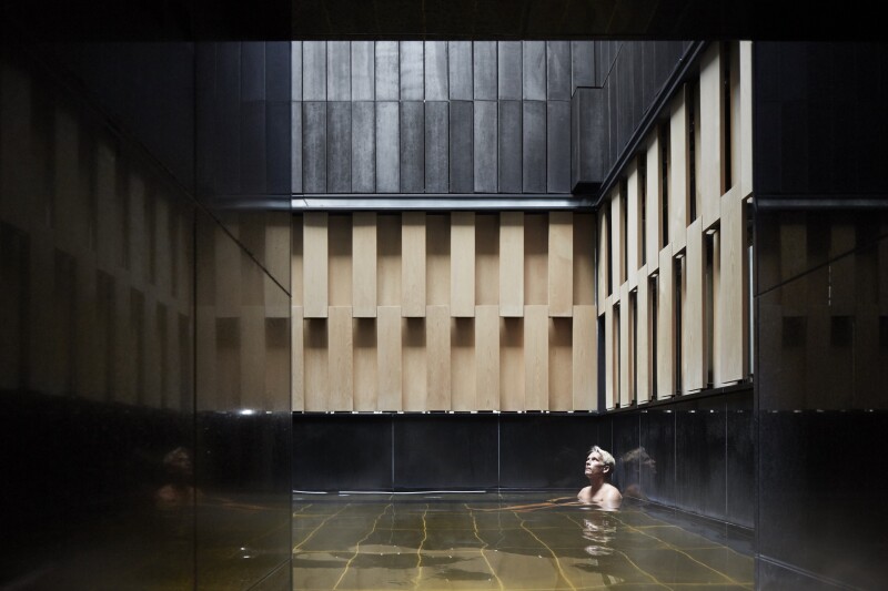 A bather in the Hoshinoya Tokyo onsen
