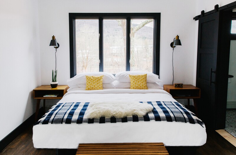 Guest rooms in Eastwind’s former-bunkhouse main building are decorated with Scandinavian flair.