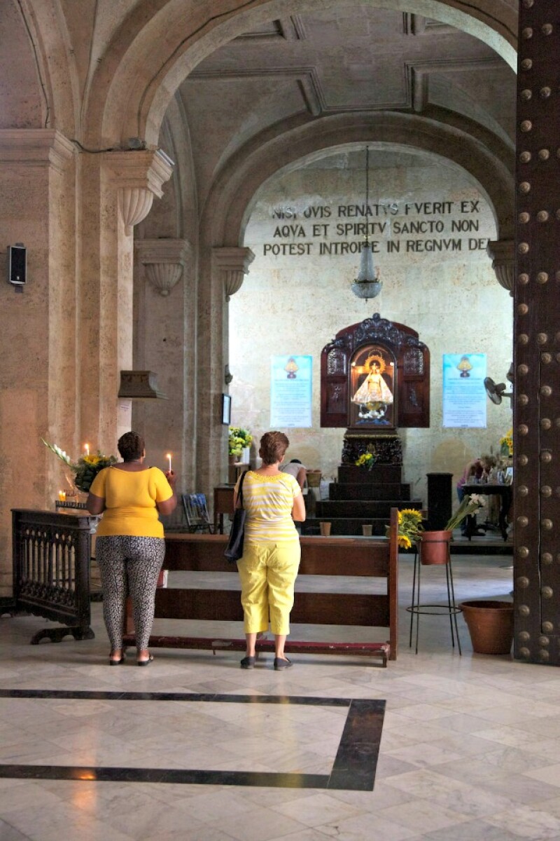 As the church named after Cuba's patron saint, Caridad del Cobre is always busy with the faithful stopping by to say prayers.