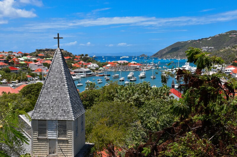Harbor in St. Bart's, Caribbean, with church steeple