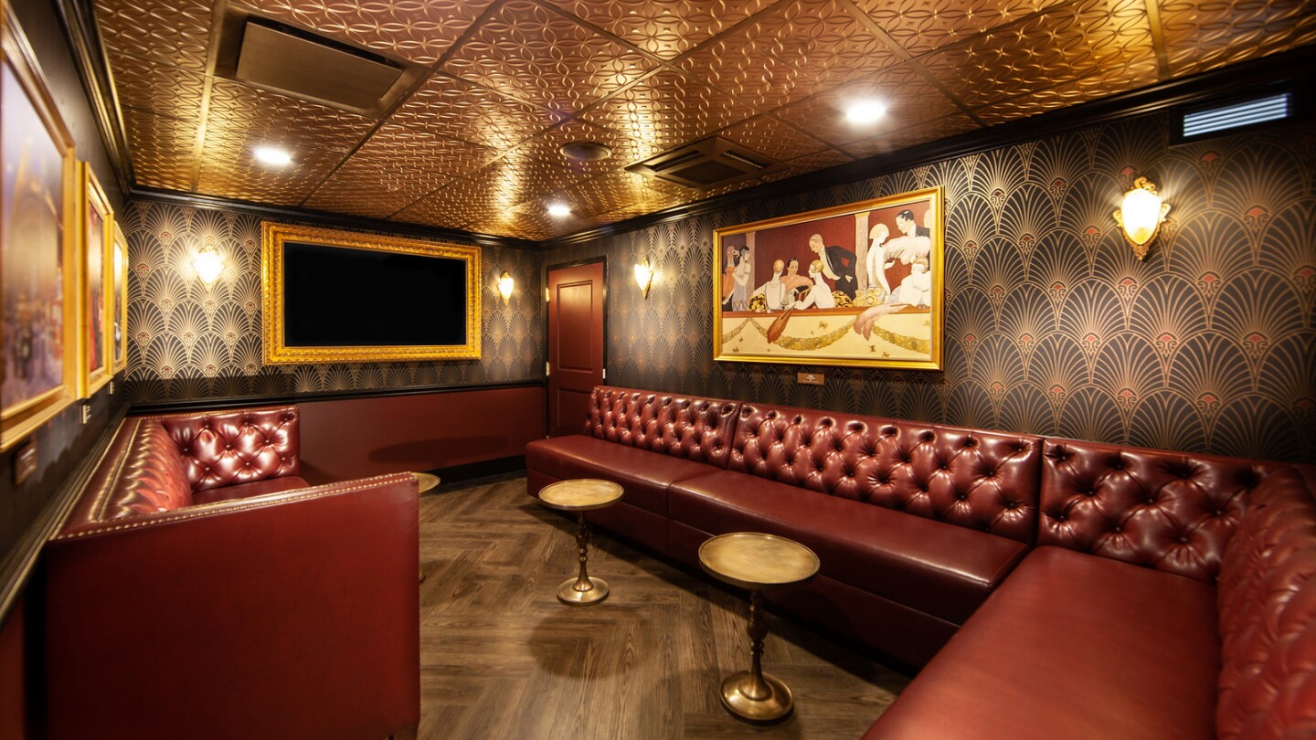 “The Fitting Room” hides behind a huge portrait of notorious speakeasy owner Mary Louise Cecilia “Texas” Guinan.