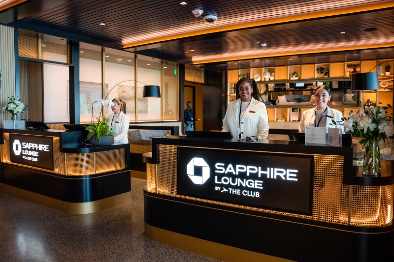 Staff at entry to Boston Chase Sapphire Lounge by the Club