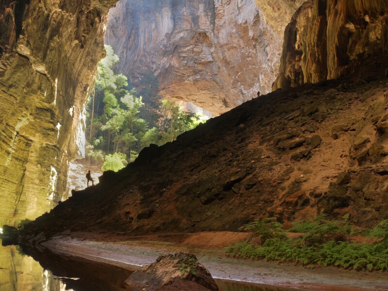 The Janelão cave in Brazil's Peruaçu River Canyon is a massive cave structure with soaring rock formations all around