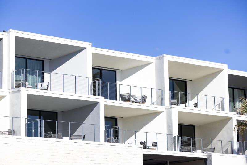 A view of the white, rectangular, balconies at the new Thompson Palm Springs hotel in Palm Springs, California.