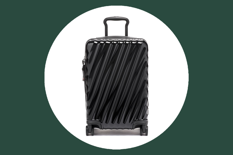 Tumi 19 Degree International Expandable 4 Wheeled Carry-On in black, with wavy ridged exterior