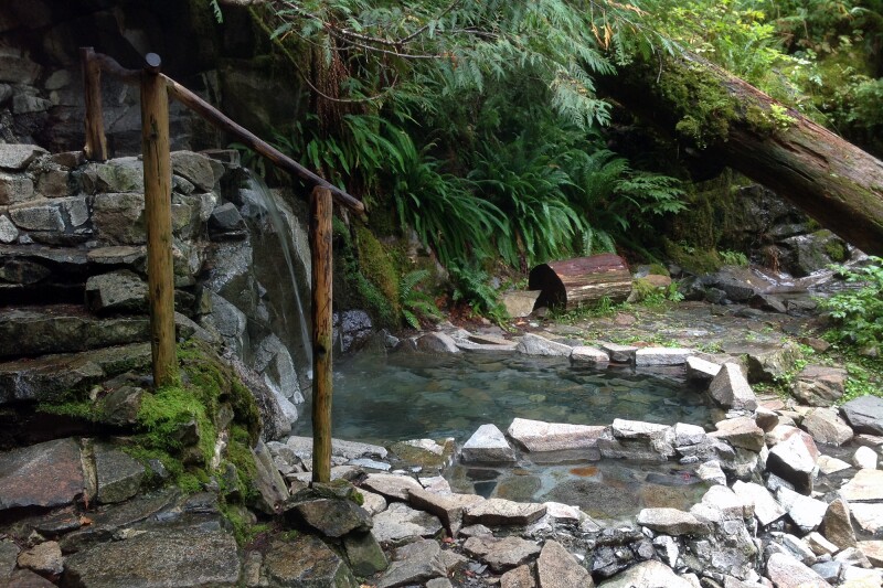 Stone steps at left leading to two small rock-lined pools at Goldmyer Hot Springs