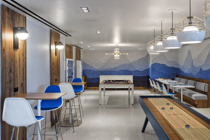 Denver Centurion Lounge game room with pool table and shuffleboard