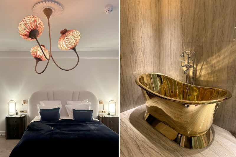 Bedroom with chandelier and brass bathtub in bathroom