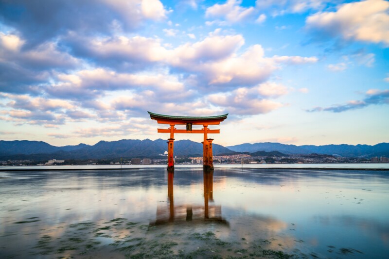 Long exposure of Floating Torii gate of Itsukushima Shrine at Miyajima, Hiroshima (gate sign reads Itsukushima Shrine)