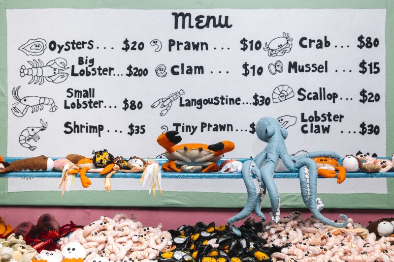 The felt “deli” is stocked with 30,000 handcrafted artworks inspired by items commonly found in the city’s famous fine food shops.
