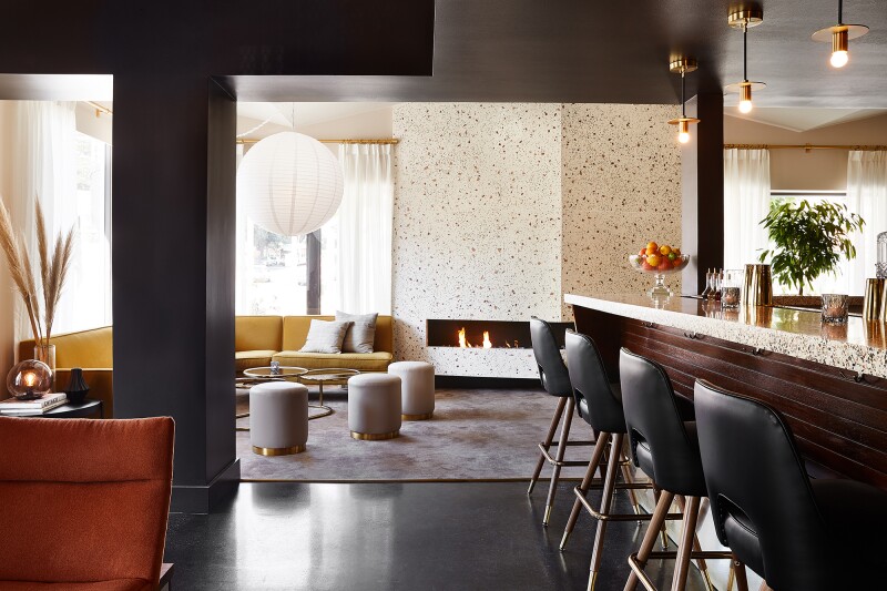 Cozy up in front of the terrazzo fireplace at the newly redone Laureate Bar.