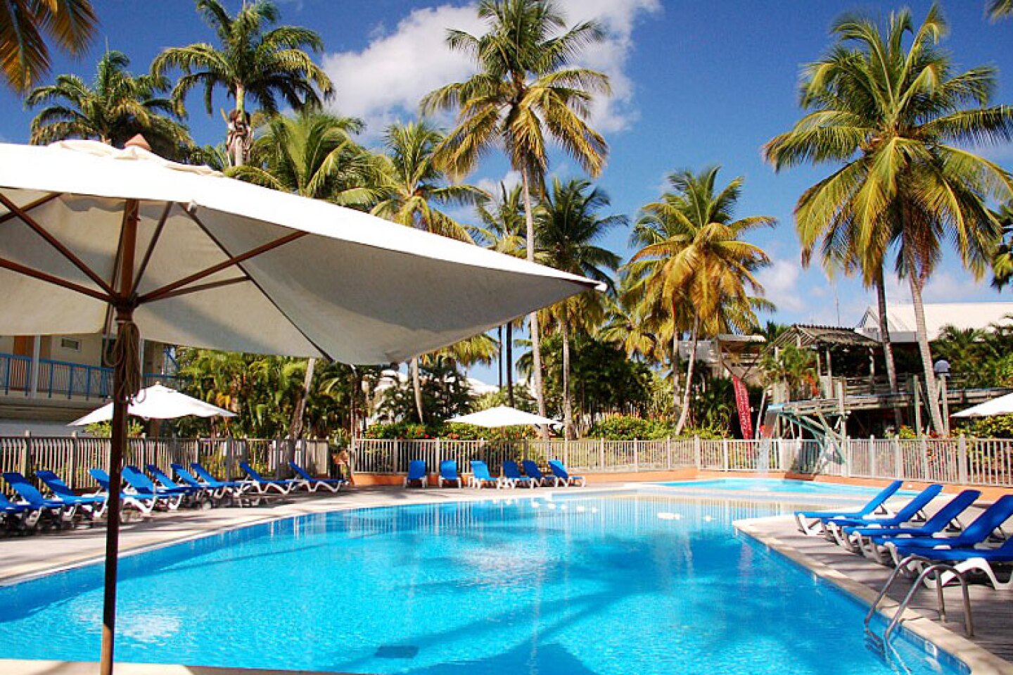 Stay busy with a water sports center, a sandy beach, and two pools at Carayou Hôtel & Spa.