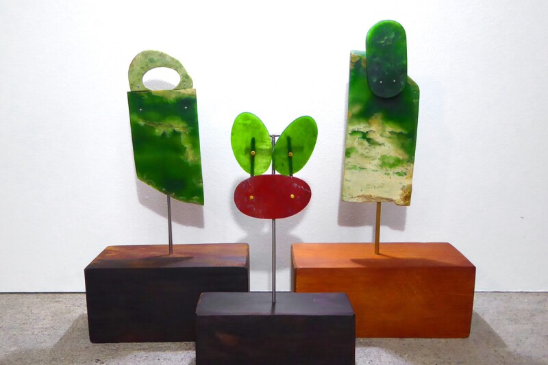 Jeweler and sculptor Neil Adcock’s contemporary Tikis, traditionally representing the first people and worn for luck in Māori culture. // Photo by Kura Gallery of Māori Art