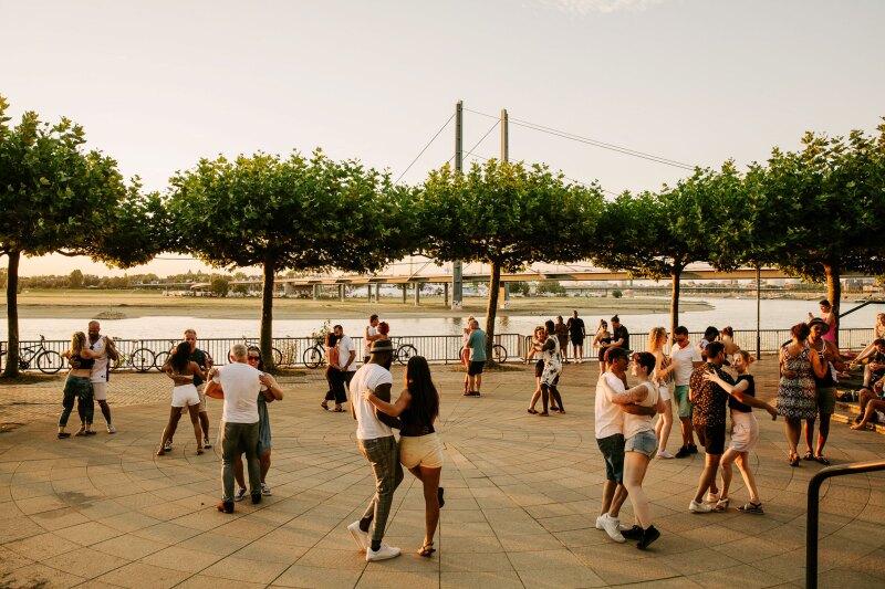Couple dancing by a river in Germany