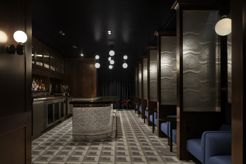 Dimly lit speakeasy bar at JFK Centurion Lounge