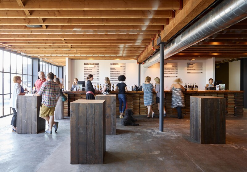 In downtown Seattle, the Charles Smith Jet City tasting room pairs wine tasting with tunes, rustic decor, and views of the runways at Boeing Field.
