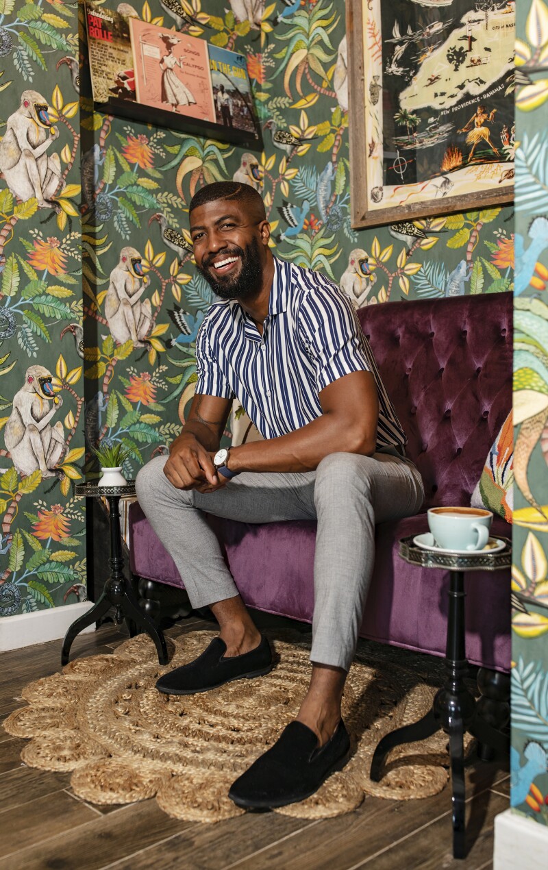 At the Bon Vivants Café & Bar in the Bahamian capital of Nassau, fashion designer Theodore Elysett settles in to enjoy his favorite drink: a double-shot mocha.