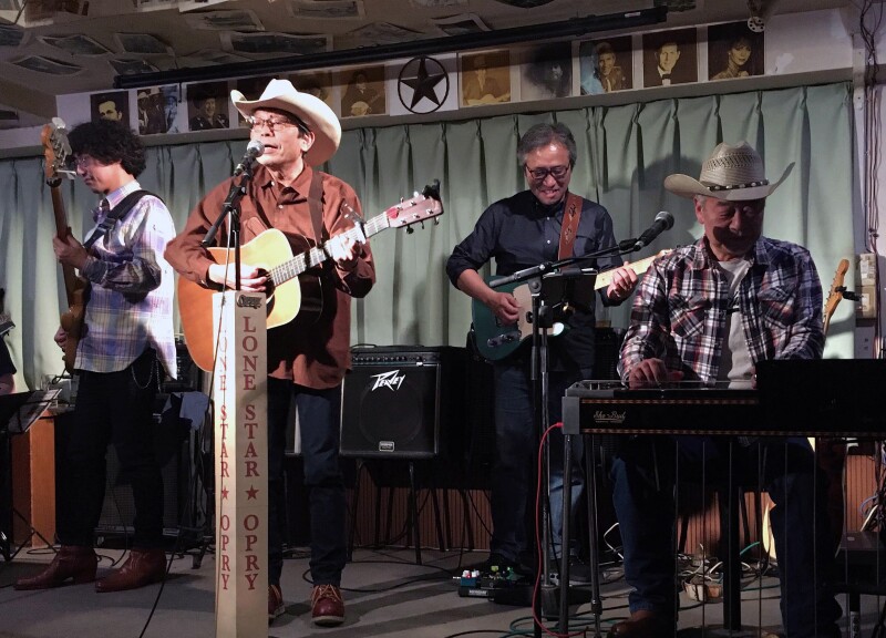 Katsuoshi Suga, or “Denver,” performing during the Lone Star Opry earlier this year.