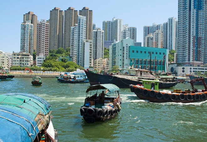Sampans travelling across the harbour, Aberdeen, Hong Kong, China.