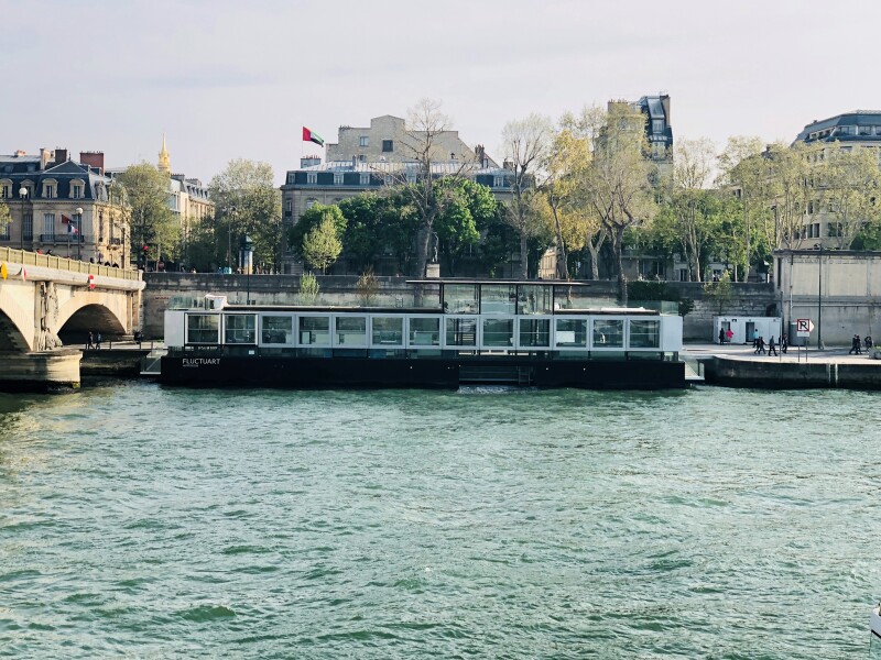 Fluctuart is located adjacent to the Invalides Bridge.