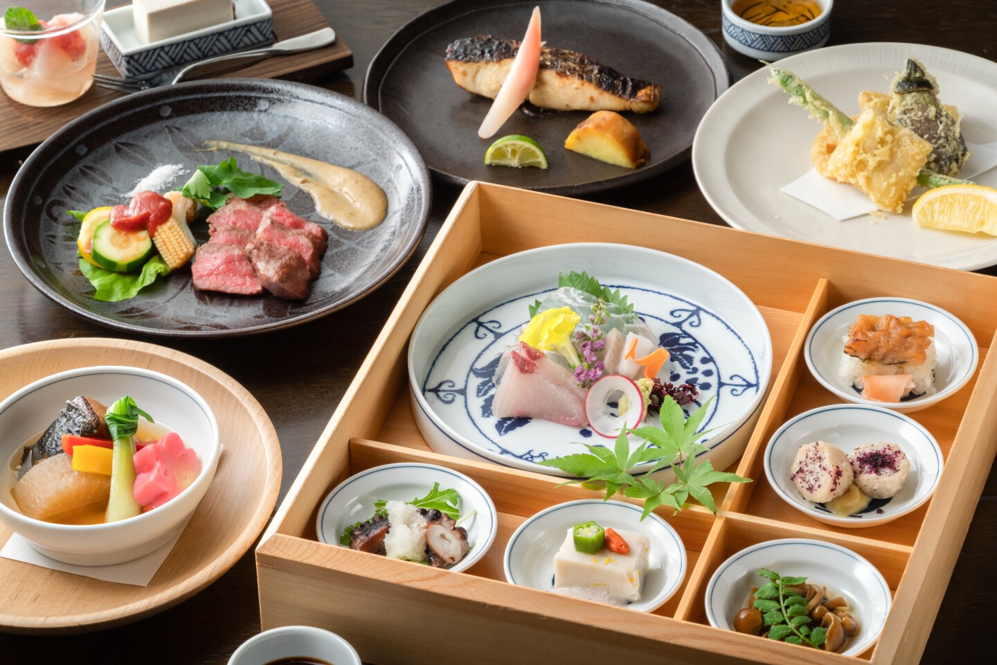 Overhead view of small plates of many different prepared foods