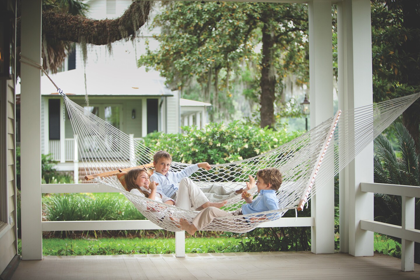 Kids in the hammock; parents at the bar
