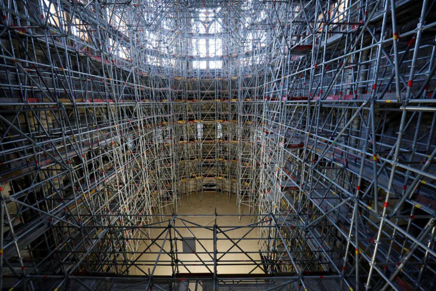 Inside Notre-Dame cathedral on June 16, 2021, with floor-to-ceiling scaffolding