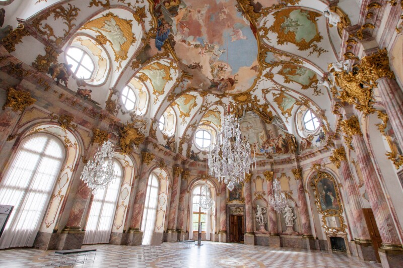 The gilded and ornately decorated Imperial Hall of the Residence Palace in Wurzburg, Germany