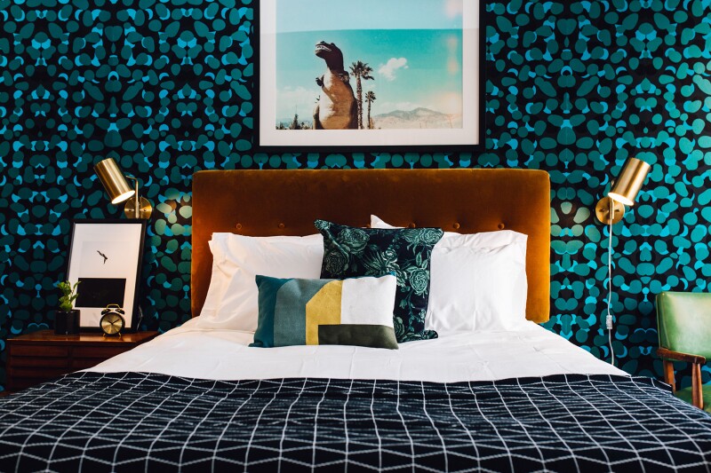 The abstract wallpaper in the Gin room is a reference to juniper berries.