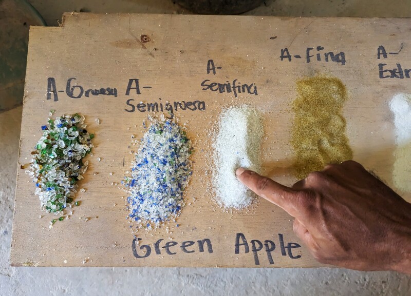 A chart with examples of ground glass at Tierra Bomba varying in fineness