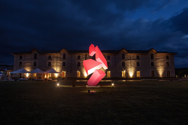 Sculptures by Rafael Barrios are distinguished by their neon colors and geometric shapes.