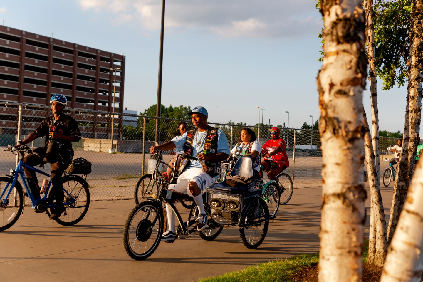 Several people on bicycles, participating in the Slow Roll
