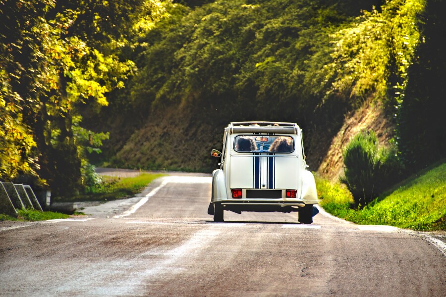 A small European car on a country road