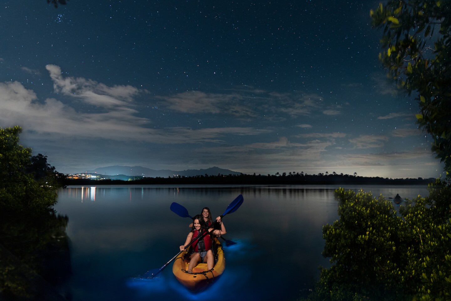 Experience the magic of Puerto Rico’s bioluminescent bays with each stroke of the paddle.