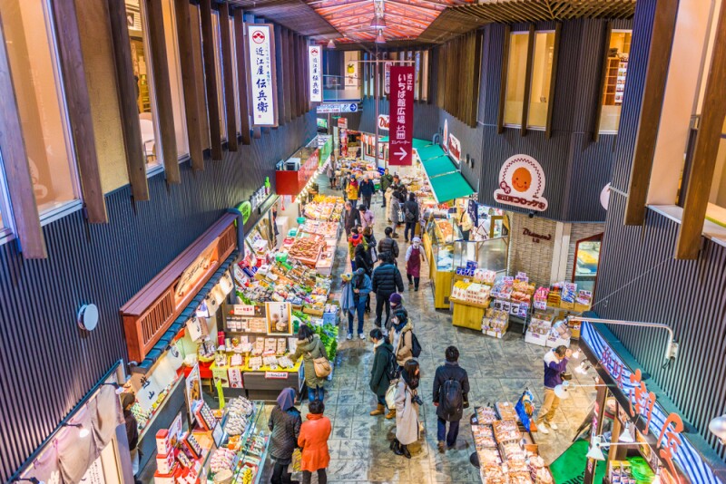 Early morning shoppers peruse fresh seafood at the the Omicho Market.