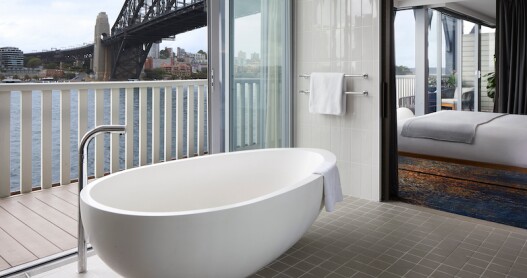 A tub with a view: Pier One overlooks Sydney Harbour and its iconic Harbour Bridge.