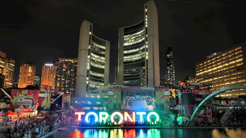 The 3D Toronto sign in Nathan Phillips Square installed to celebrate the 2015 Pan American Games (Pan Am Games) in Toronto, Ontario, Canada. The Toronto city hall building can be seen in the background. - TORONTO, ONTARIO, CANADA, 20/07/2015
