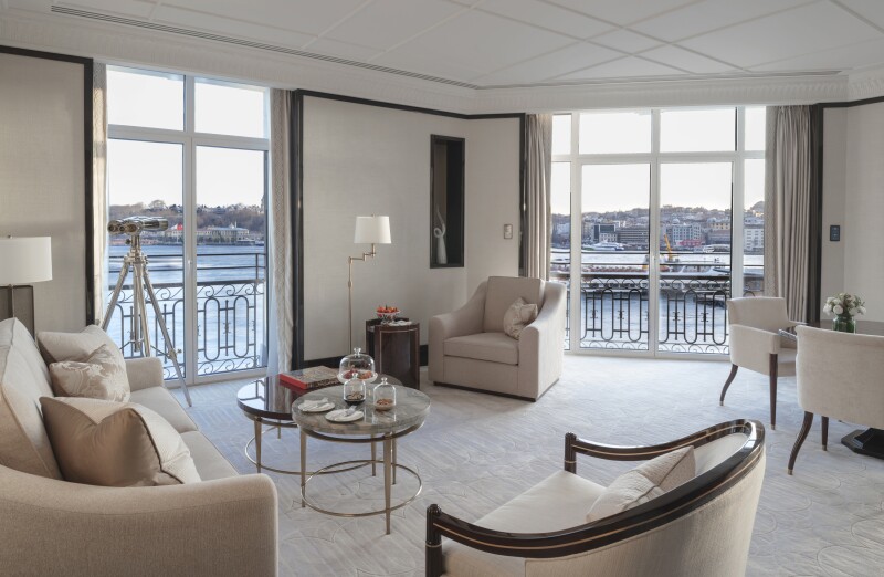 Dove-gray corner living room of this Executive Bosphorus Suite features views of the famous strait