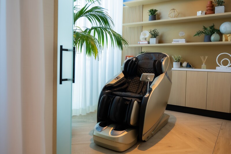 A massage chair in Boston Chase Sapphire Lounge by the Club