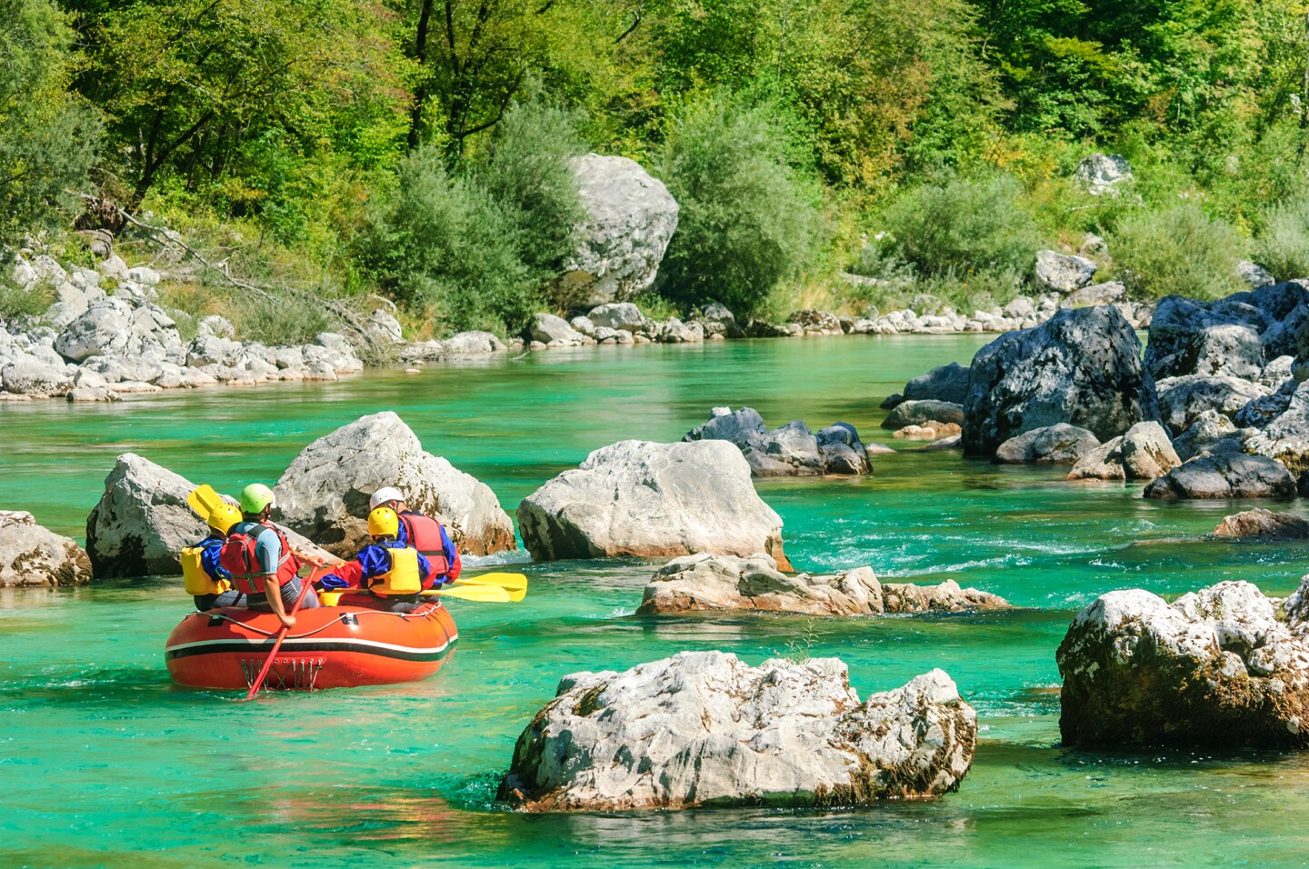 A raft on calm, rocky river