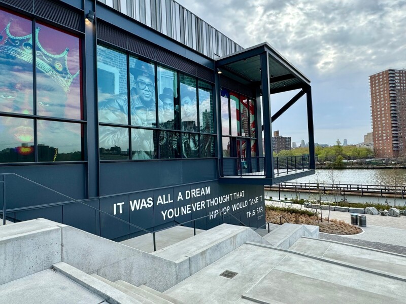 New York, NY USA - April 19, 2024 : Side view of The Hip Hop Museum with a Notorious B.I.G. quote at the Bronx Point building next to the Harlem River in the South Bronx, New York City
