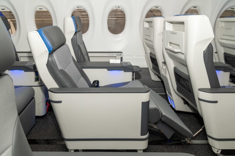 A Breeze first-class seat in the recline position
