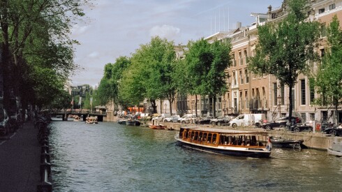 A sightseeing boat on the Rhine River in Amsterdam.