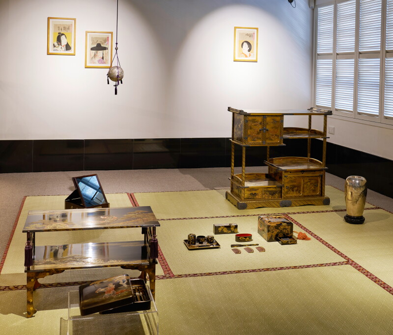 Two wood tables in gallery