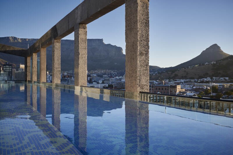The rooftop pool at the Silo Hotel in Cape Town, South Africa, with views of Table Mountain and Lion's Head peak