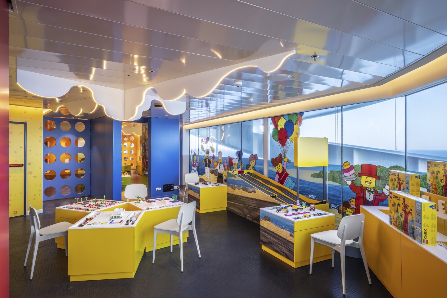 MSC "World Europa"'s LEGO-themed kids club play area in yellow and blue
