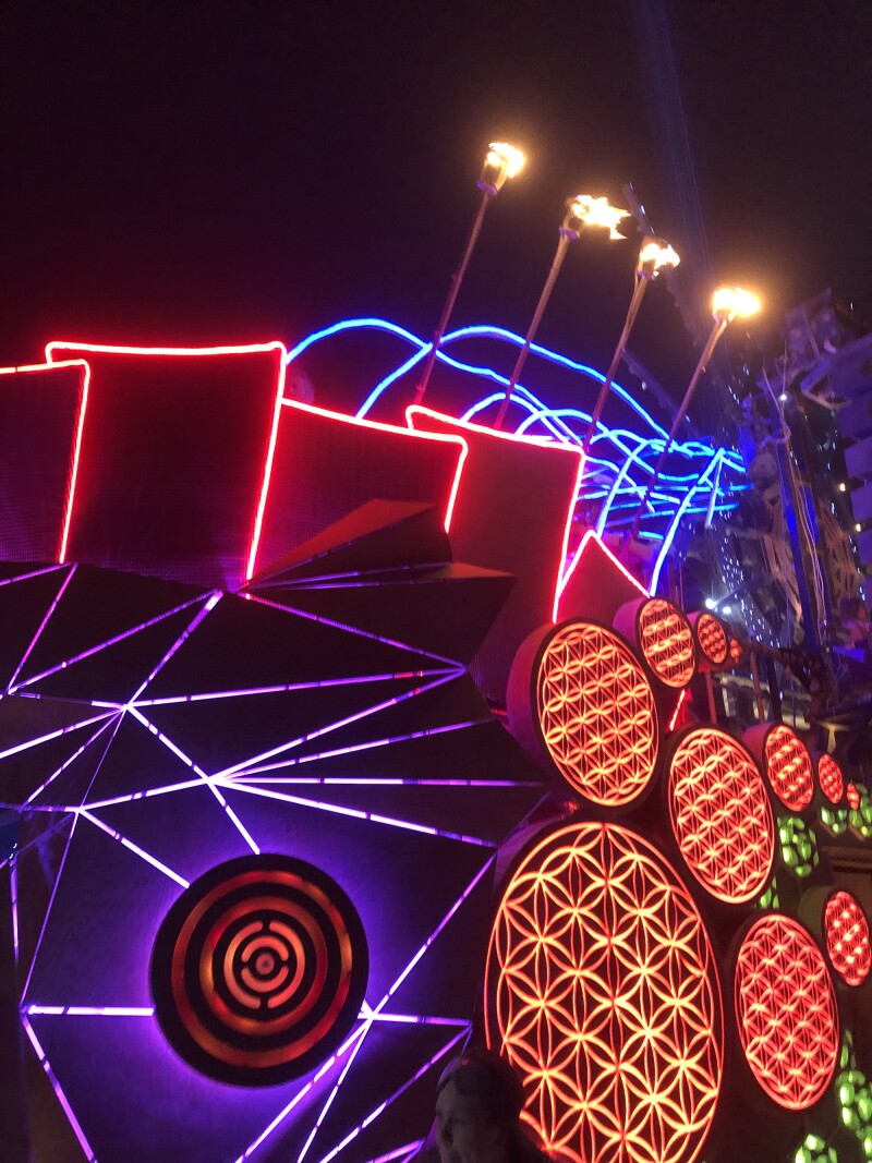 An illuminated Mayan warrior art car.